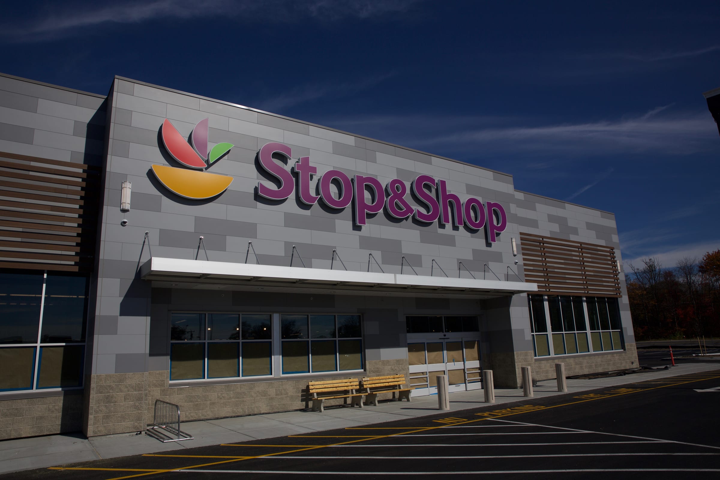 Stop and Shop storefront with large illuminated channel letters at dusk