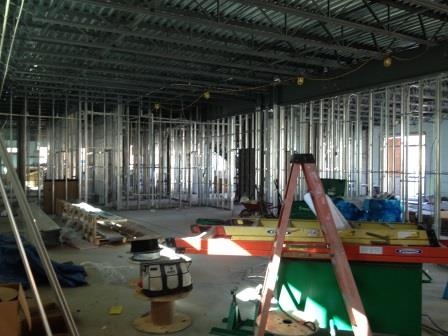 Interior fit out under way with wire reels and a ladder on the floor