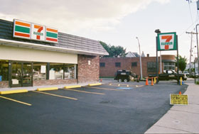 Sealcoated and striped convenience store lot in Brighton, Massachusetts