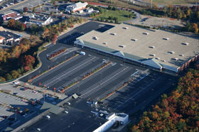 Aerial view of a striped warehouse parking lot in Plymouth, Massachusetts