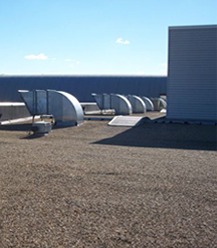 Rooftop duct runs on a commercial building
