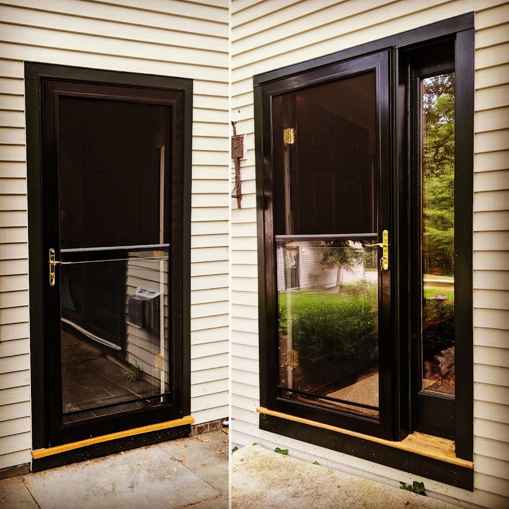 Two dark storm and screen doors installed on a clapboard house