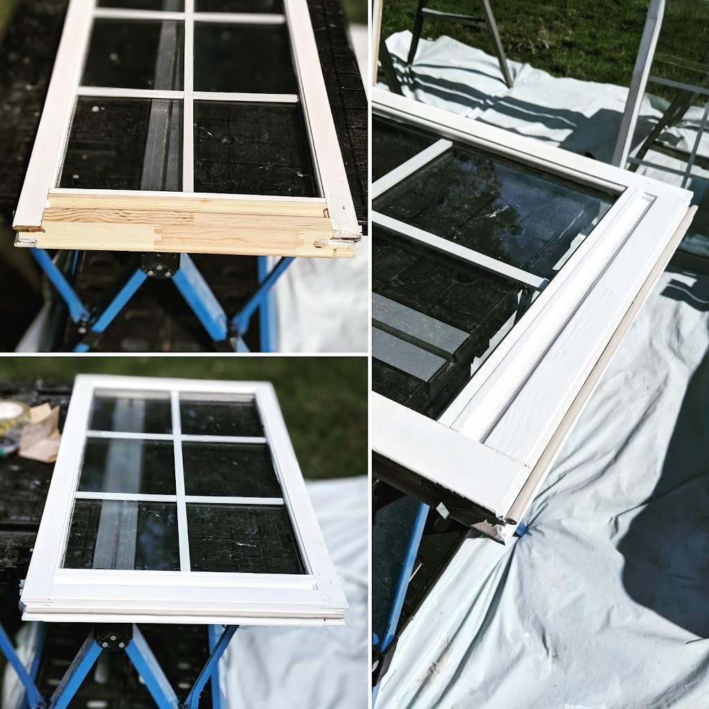Window sashes laid out on sawhorses during restoration work